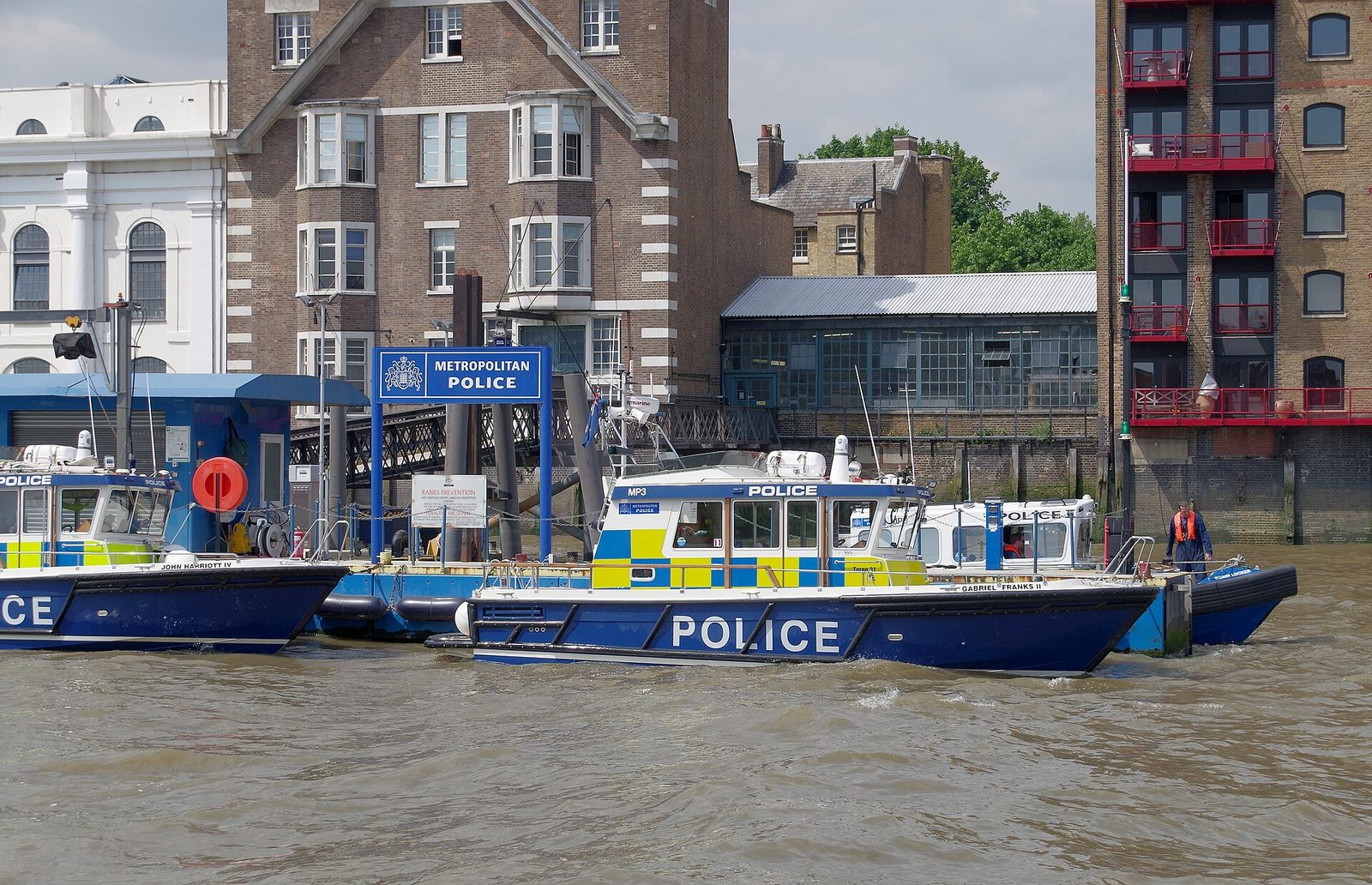 Metropolitan Police pier on the river with police boats