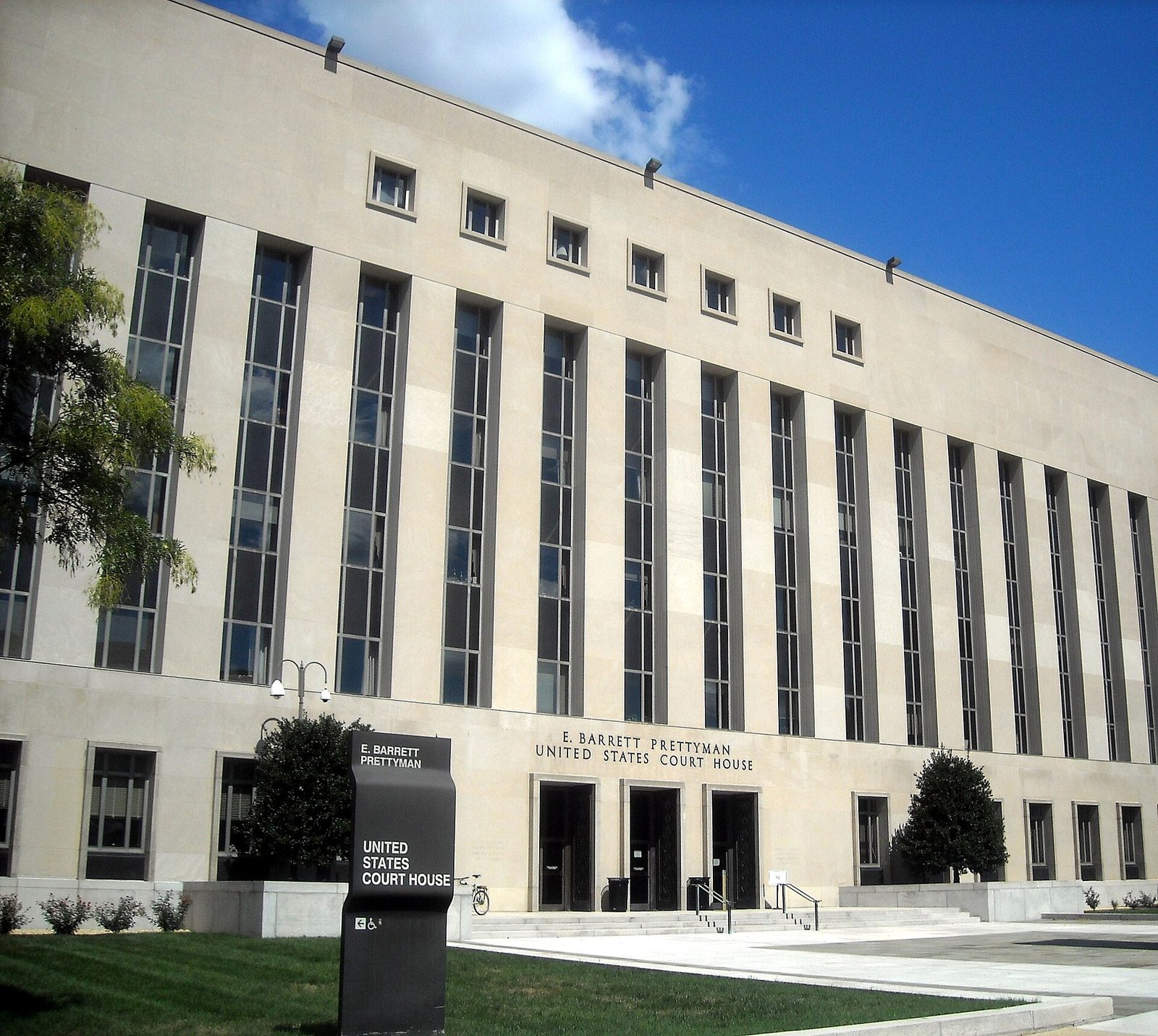 Front facade of a federal courthouse, sign and entrance visible, Washington