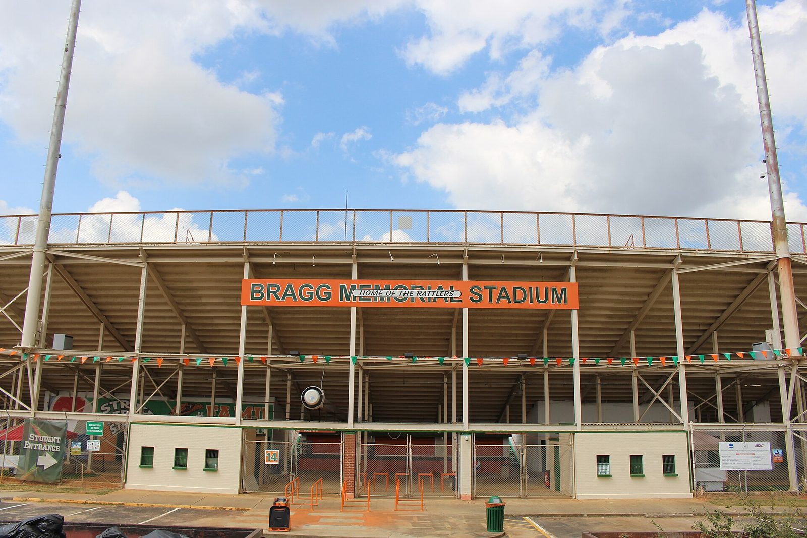 Front entrance of stadium with 'BRAGG MEMORIAL STADIUM' sign, Bragg Memorial Stadium
