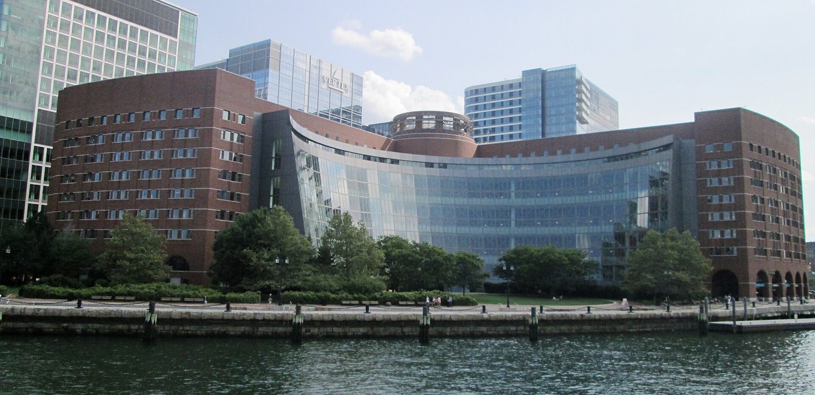 Front view of Moakley courthouse, curved glass centre and brick wings, Massachusetts