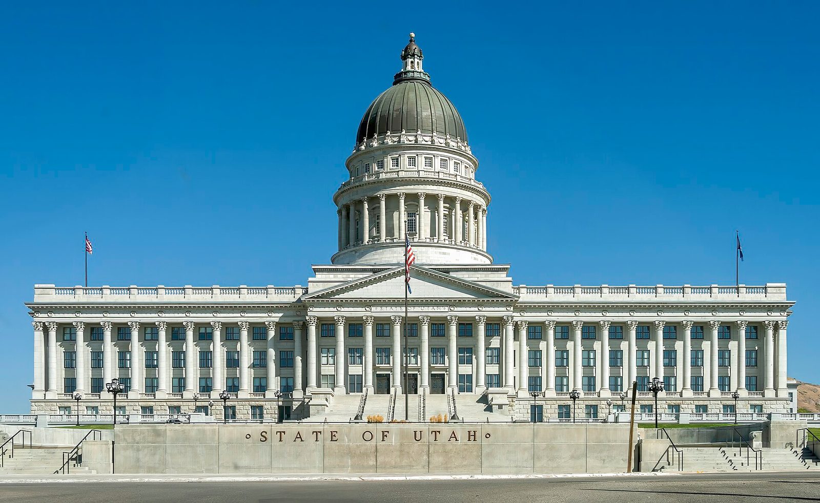 Front of capitol building, concrete wall labelled 'STATE OF UTAH', Utah