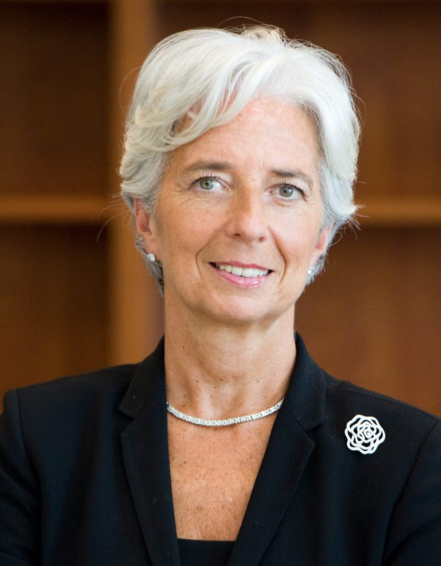 Head-and-shoulders portrait of a woman, neutral indoor background