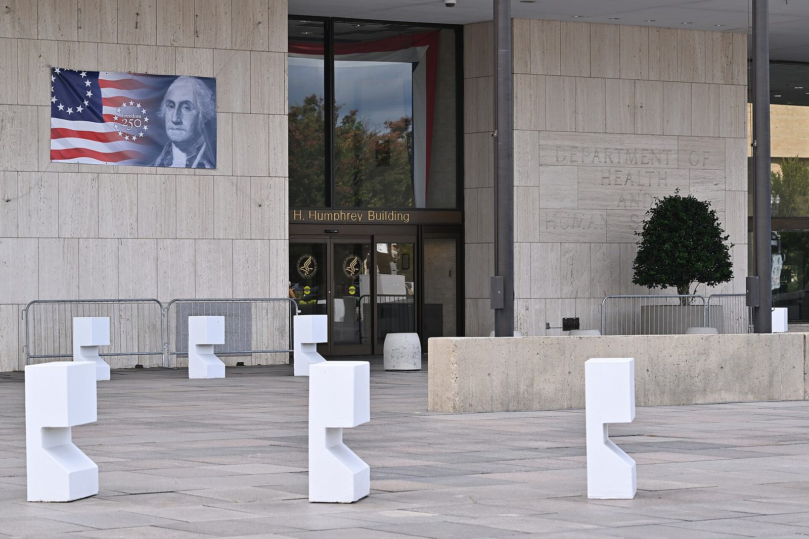 Entrance to Hubert H. Humphrey Building with semiquincentennial banner, Washington