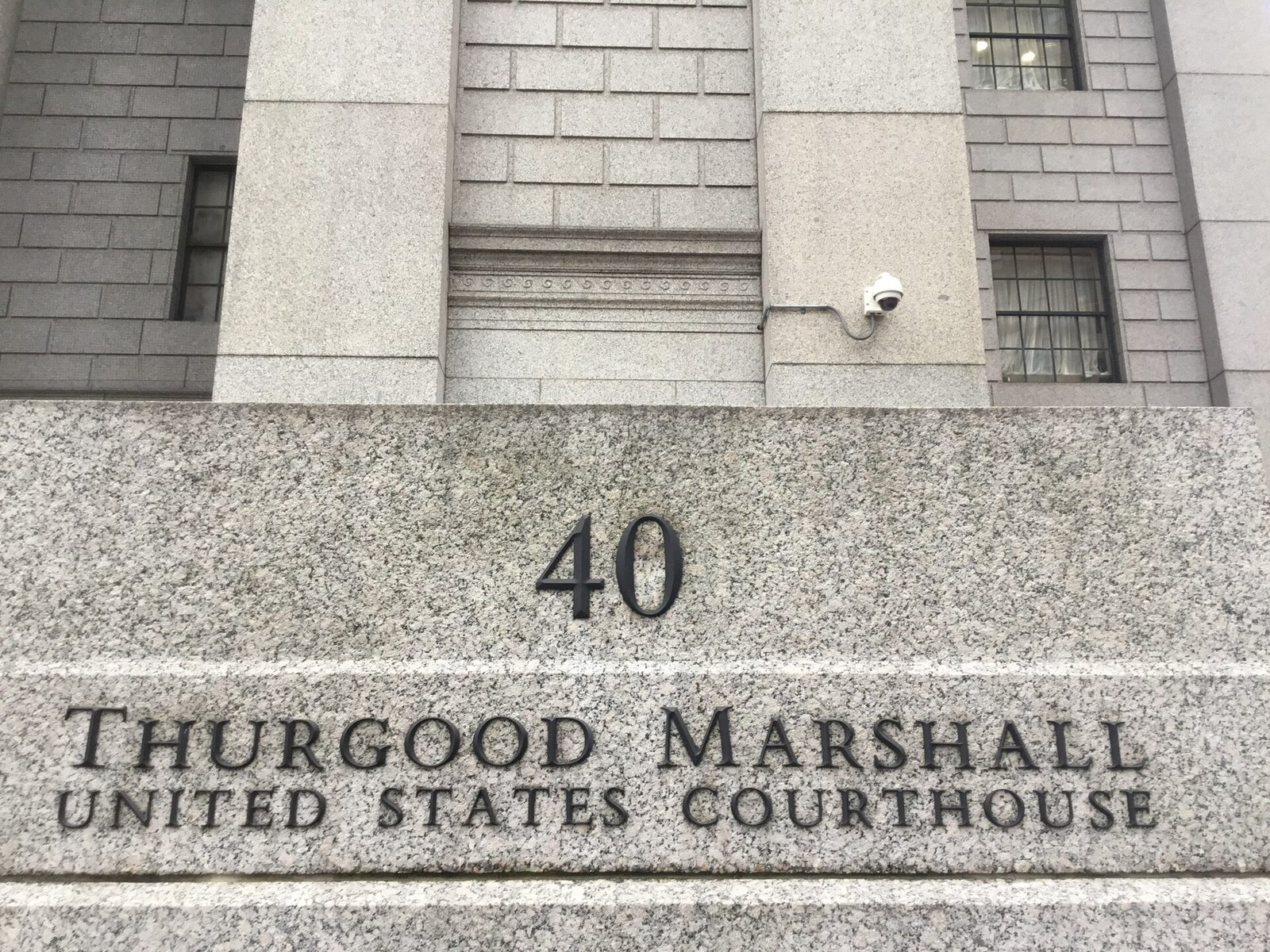 Granite sign reading '40 Thurgood Marshall United States Courthouse'