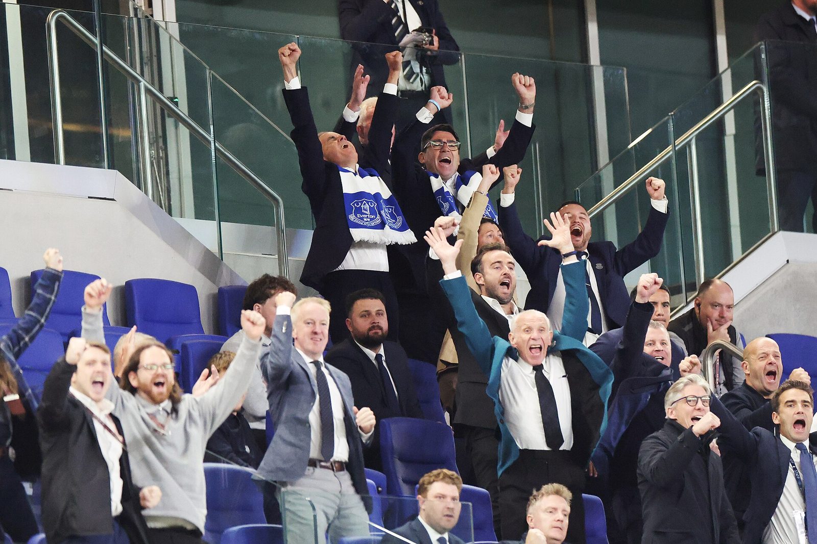 Group of spectators cheering in an executive box at match, Hill Dickinson Stadium