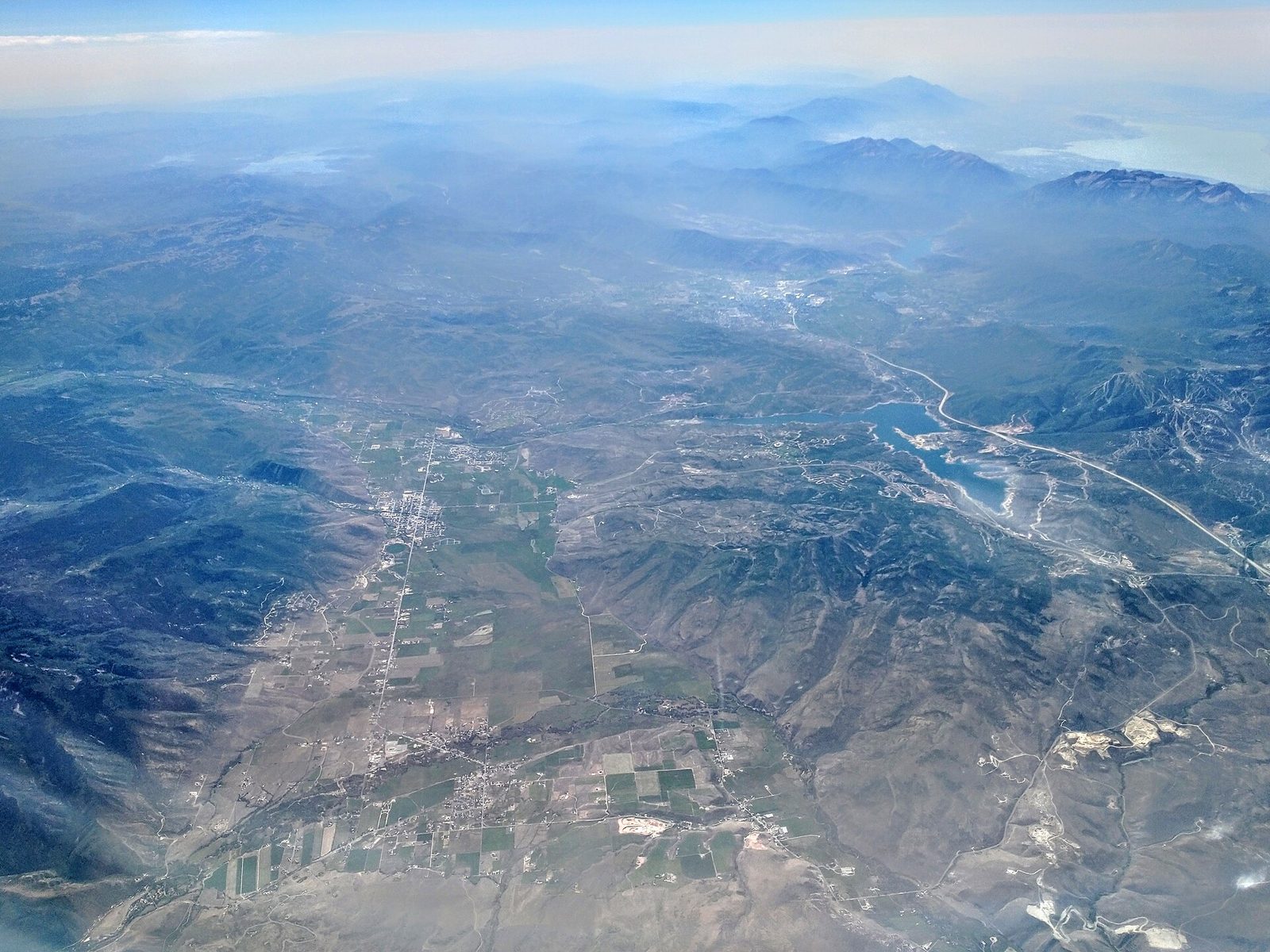 aerial view of valley, reservoir and small towns in a mountain basin, Summit County