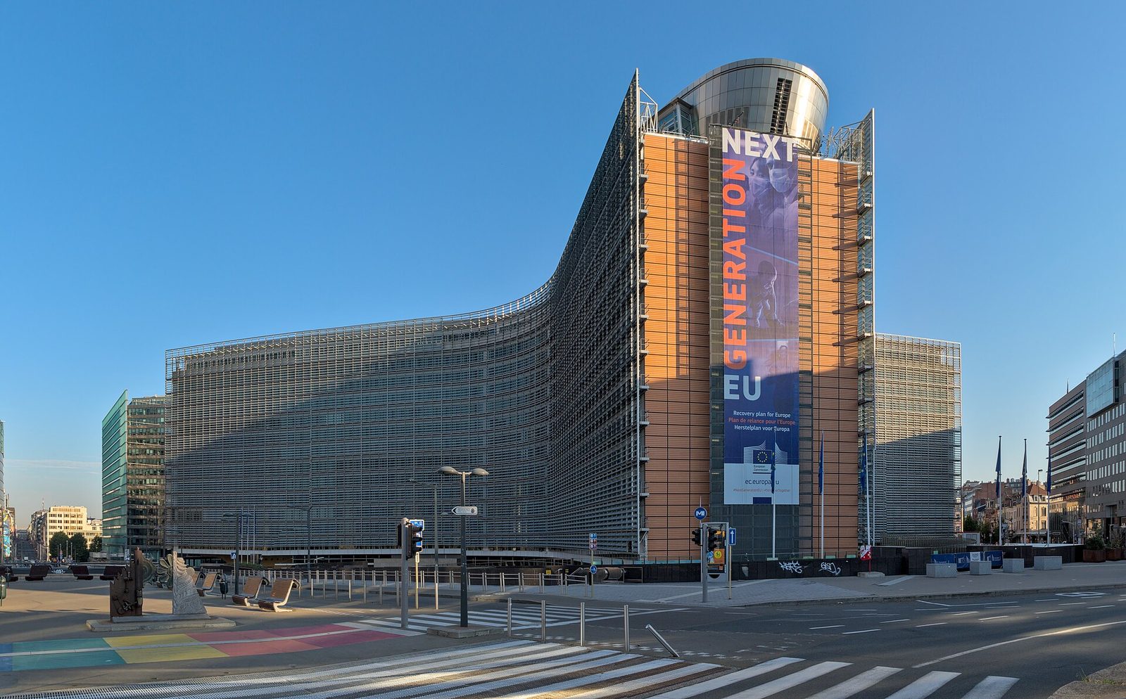wide view of Berlaymont building, banner reading NEXT GENERATION EU, Brussels