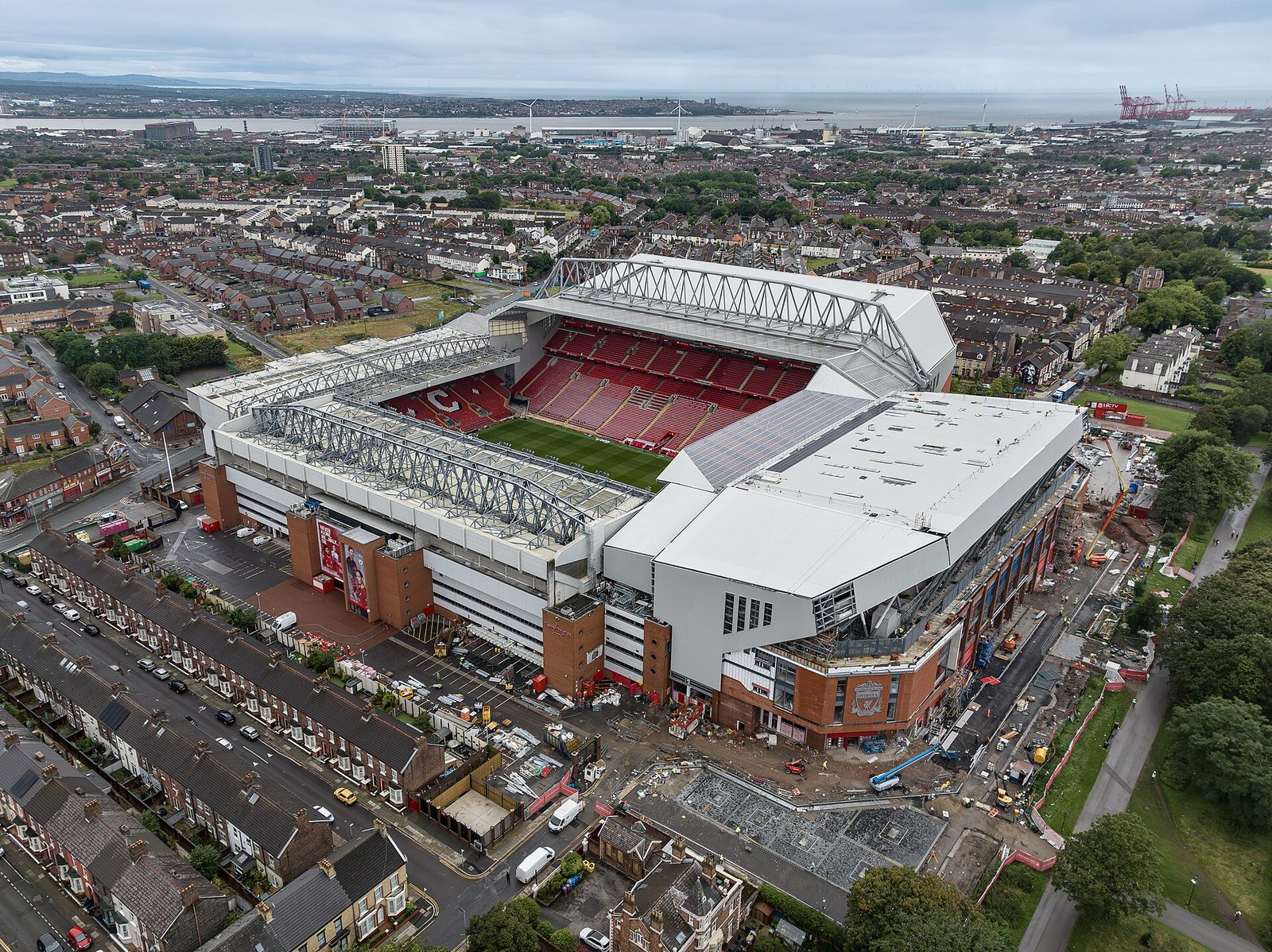 Aerial view of Anfield stadium, surrounding streets and docks beyond, Anfield