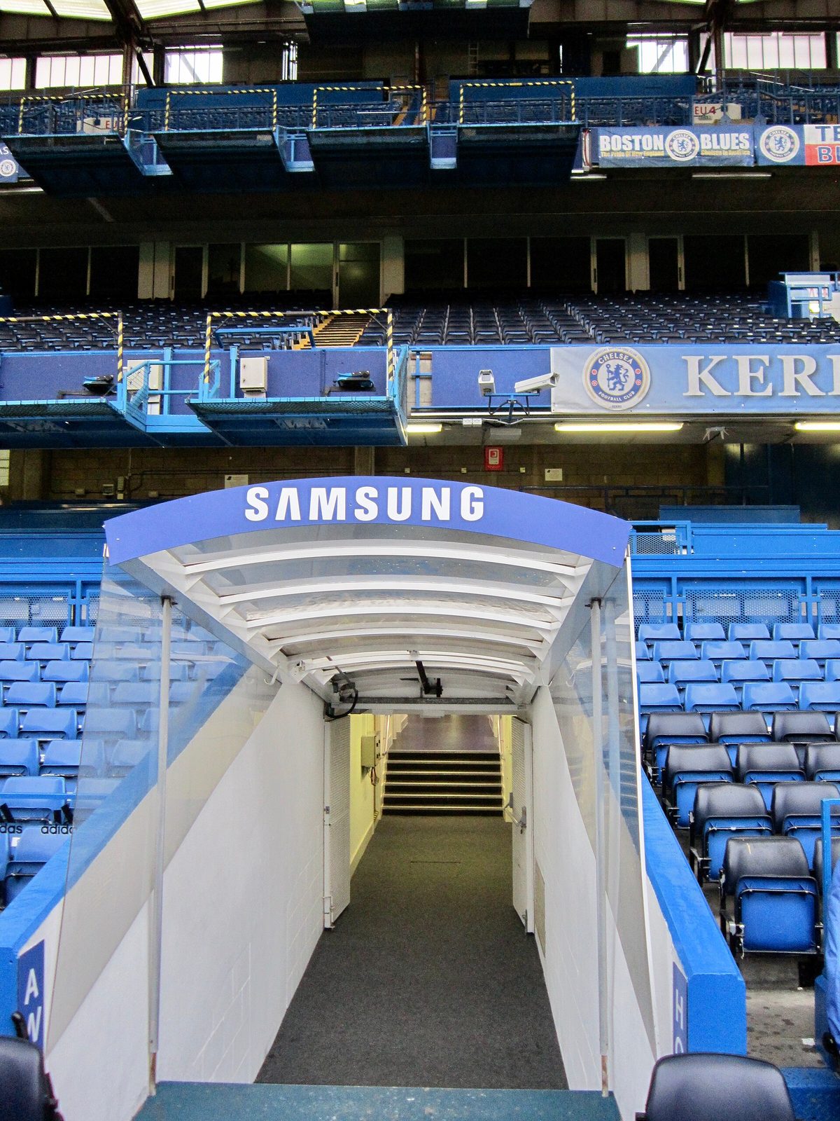 Players' tunnel and dugout entrance, Samsung sign above the walkway, Stamford Bridge
