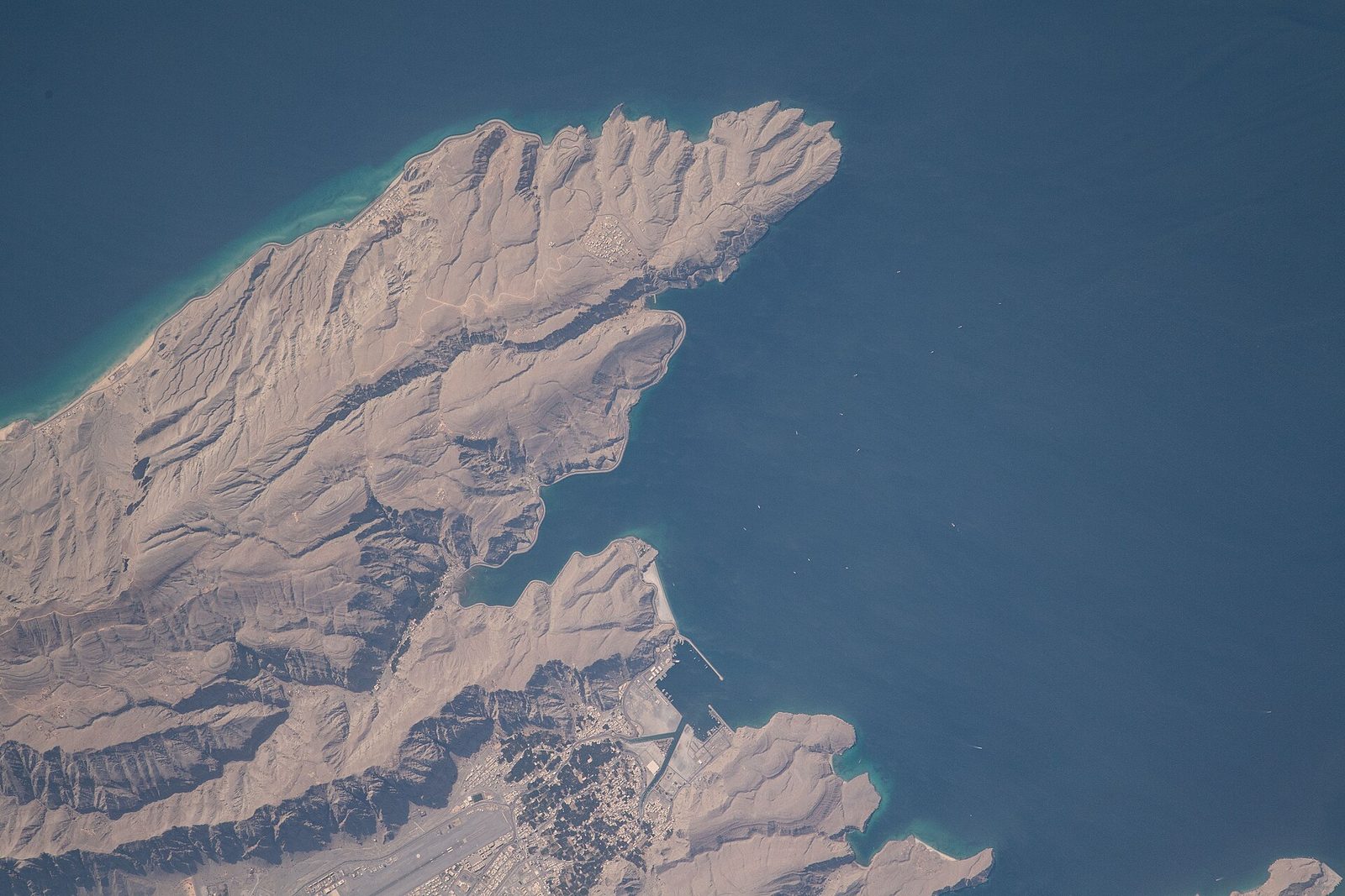 Aerial view of the Musandam peninsula and Khasab harbour from orbit, Khasab