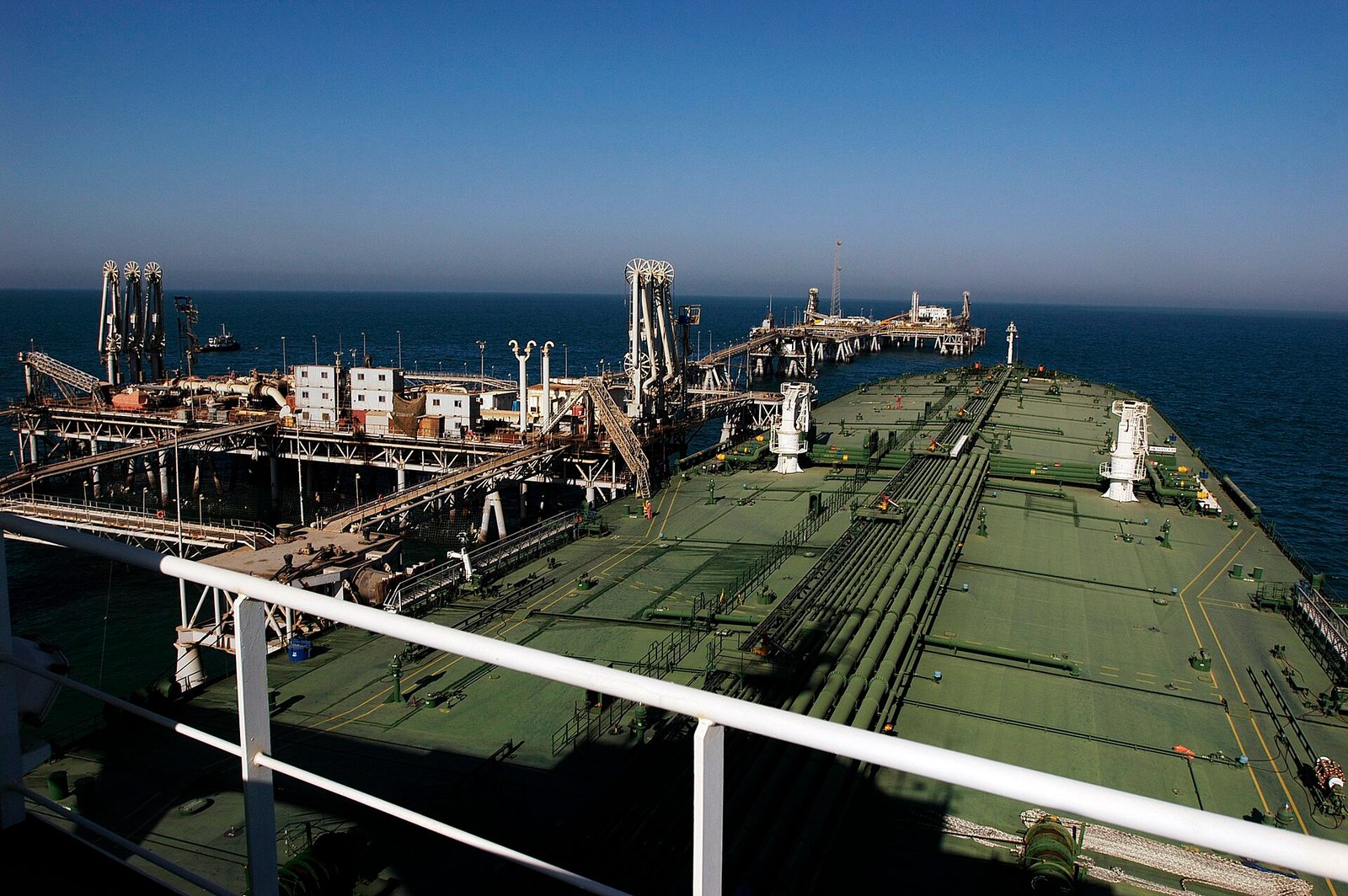 oil tanker moored at an offshore loading terminal, deck visible, Persian Gulf