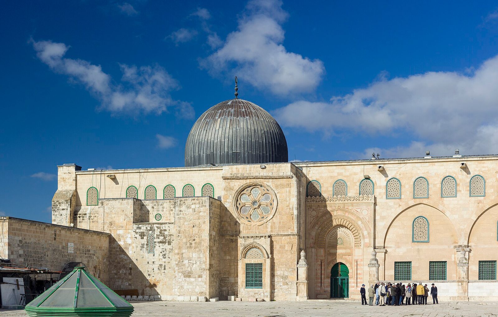 Eastern façade of Al-Aqsa Mosque, small group gathered on plaza, Al-Aqsa Mosque