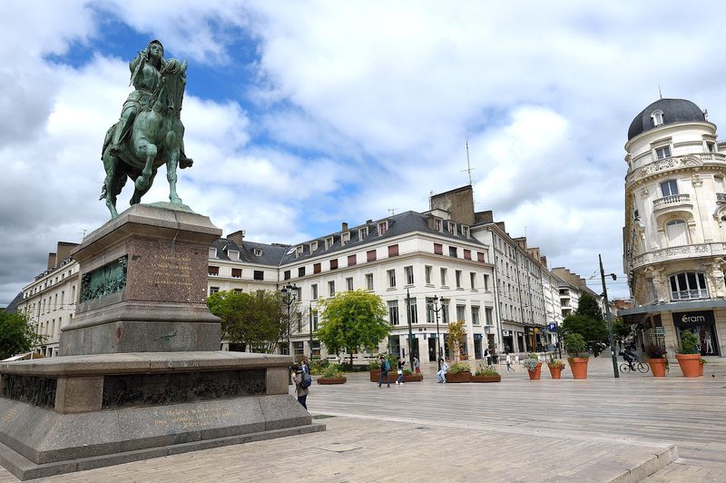 equestrian statue on a wide city square, surrounding buildings, Orléans