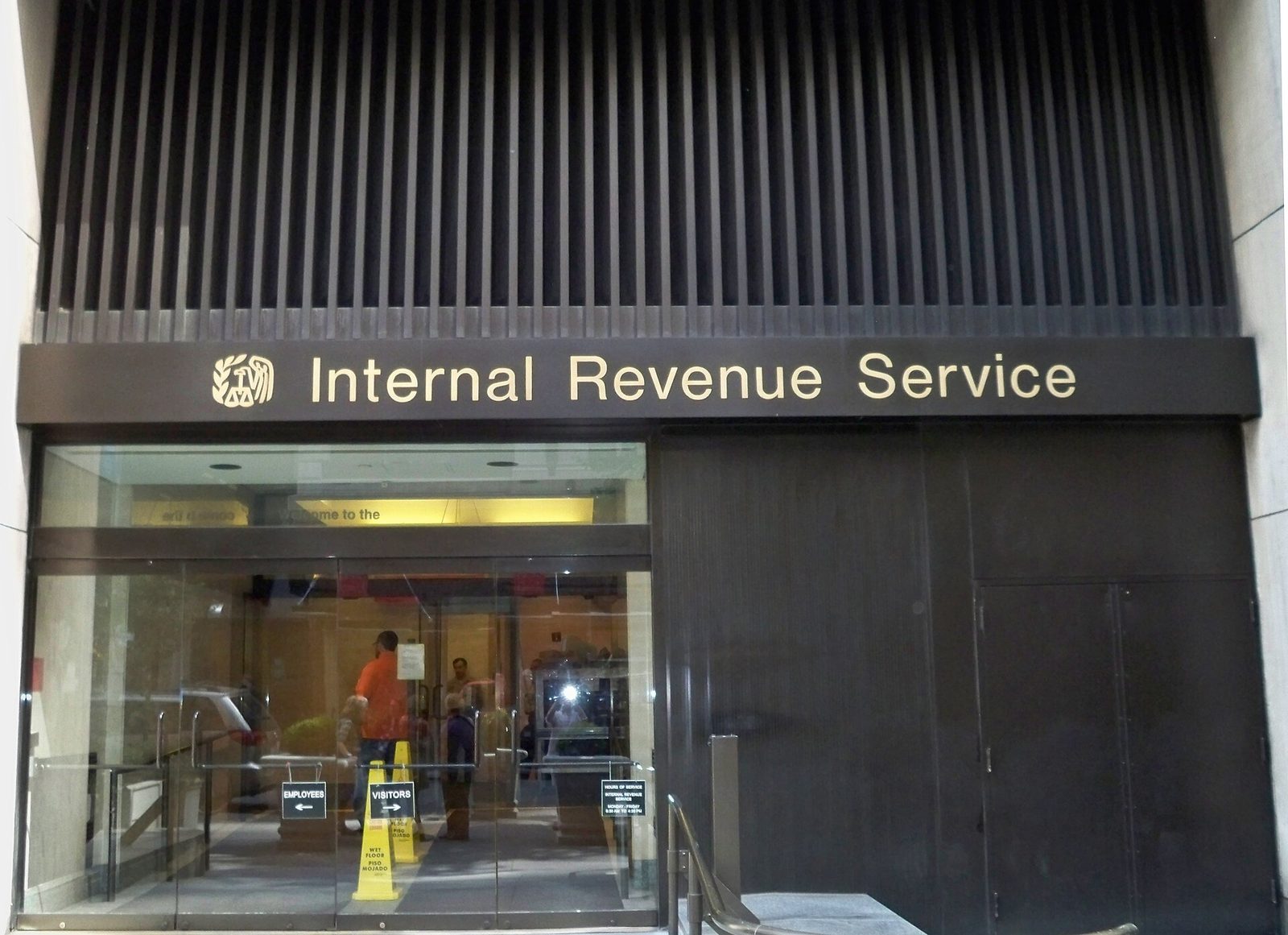 Glass entrance with 'Internal Revenue Service' sign above doors
