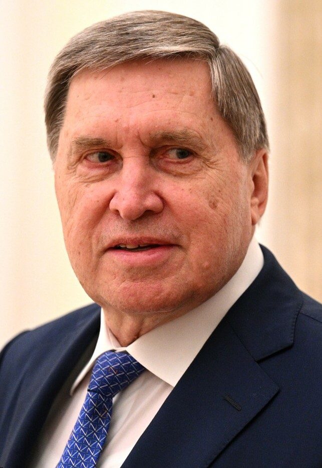 Close head-and-shoulders portrait of an older man in suit and tie