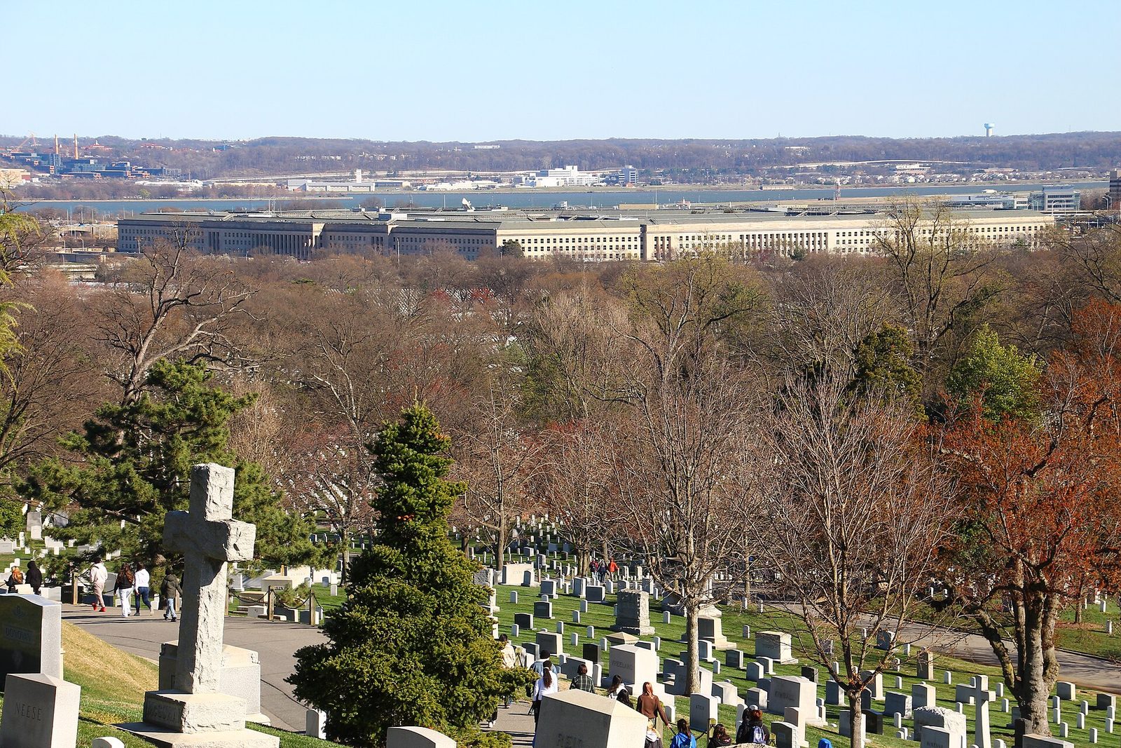 wide low beige office building beyond a tree-filled cemetery foreground, The Pentagon