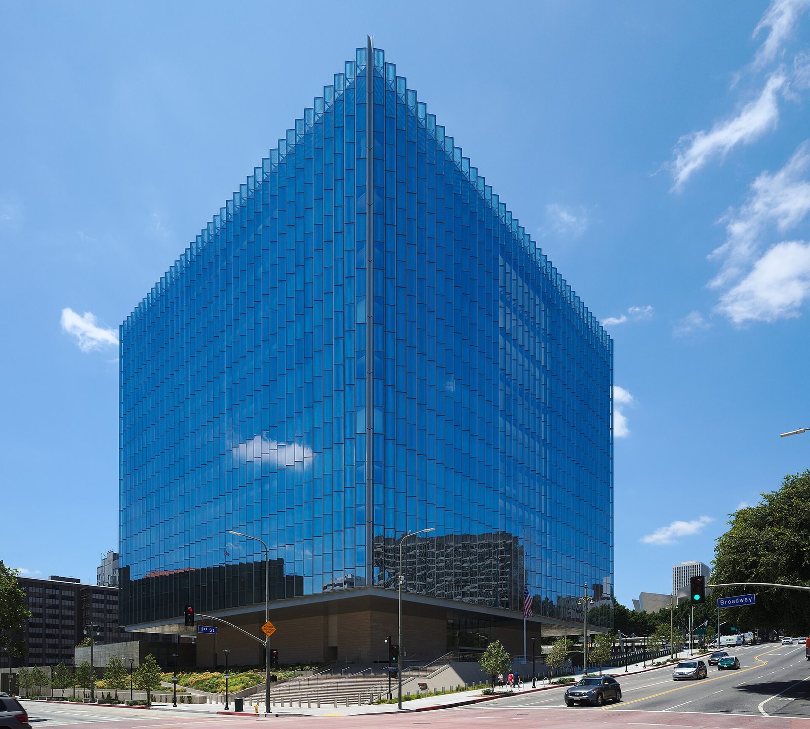Glass-faced federal courthouse building, street and cars in front, Los Angeles
