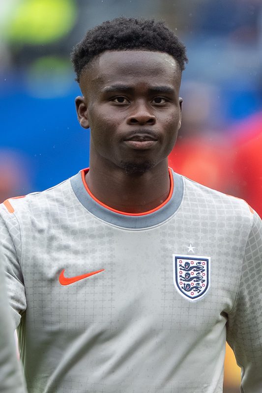 close-up of a male footballer in an England training top