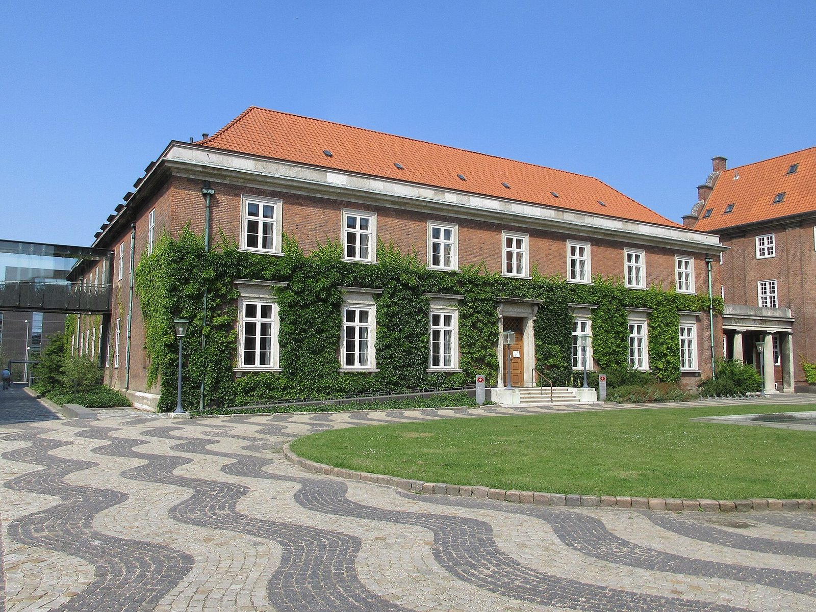 Red brick courthouse, patterned pavement and main entrance steps, Copenhagen
