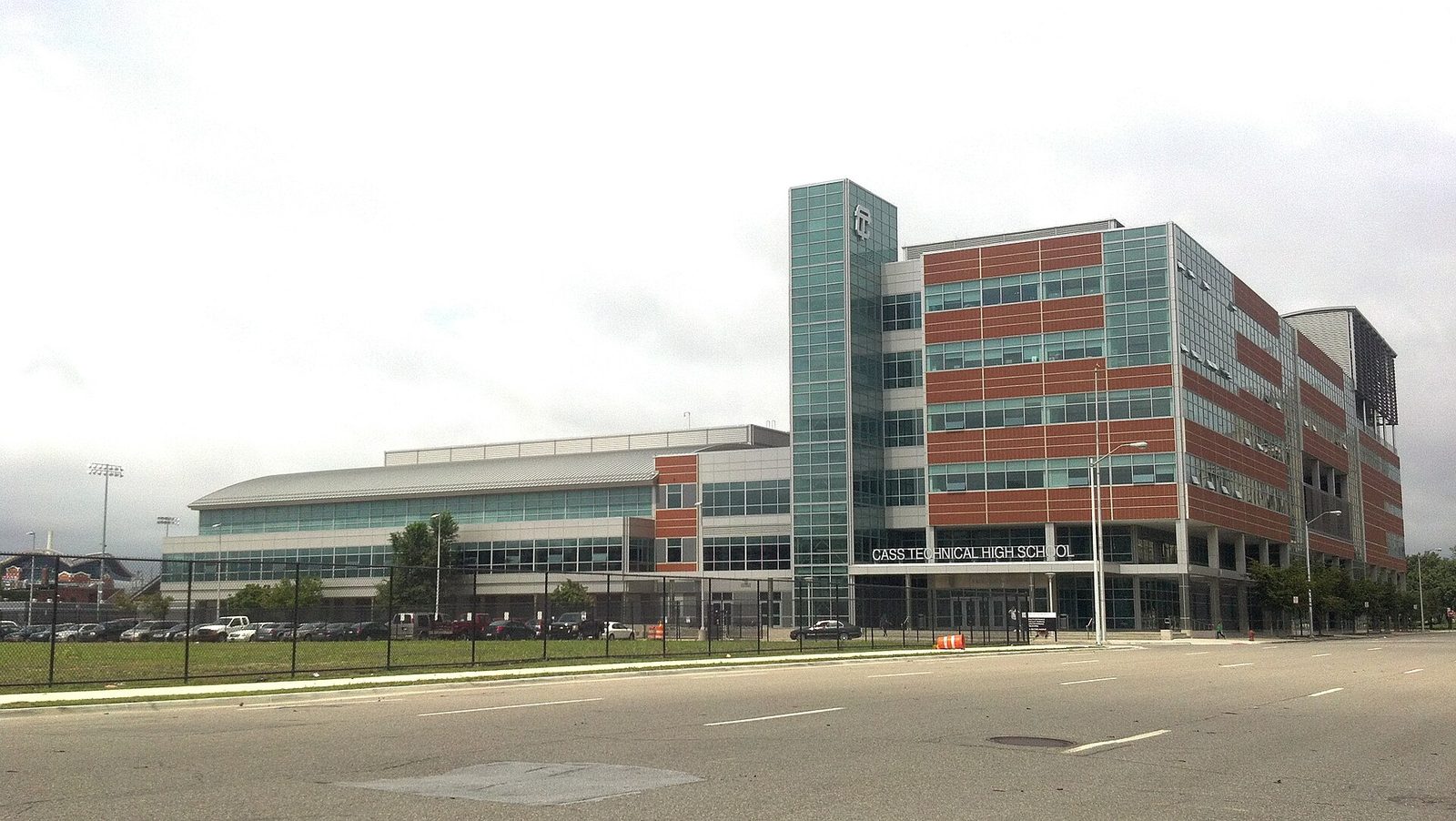 Modern multi-storey school building, glass and red brick facade, Cass Technical High School