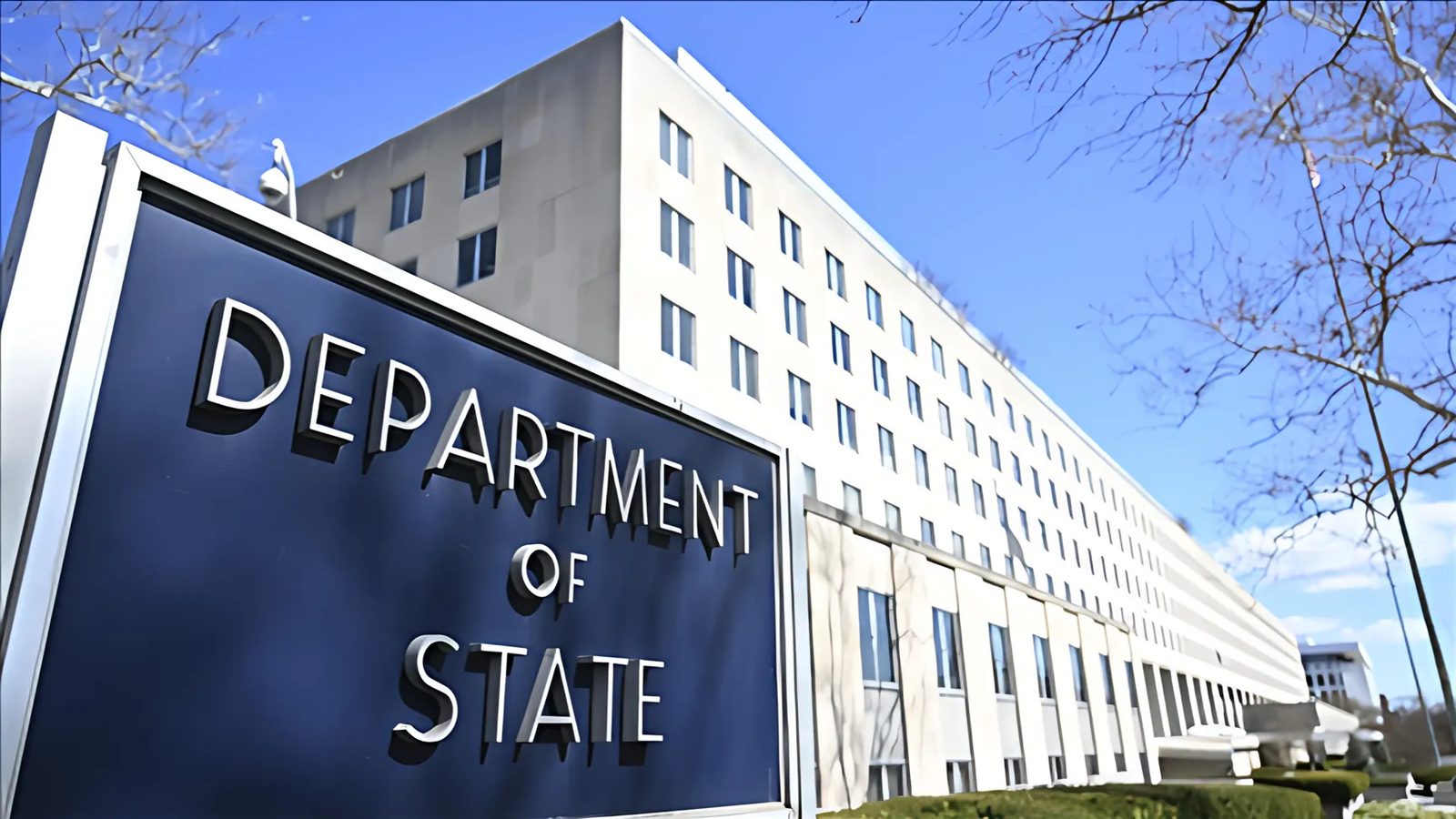 Department of State sign in front of the U.S. government building