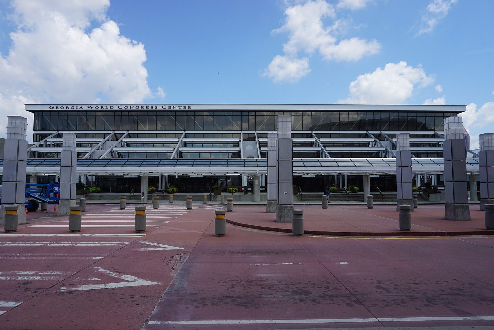 front façade of a convention centre with 'Georgia World Congress Center' signage, Atlanta