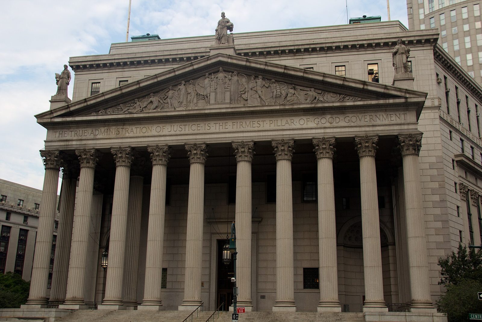 front façade of courthouse, row of Corinthian columns, carved pediment, New York